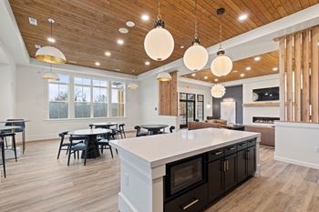 community room with a large kitchen and dining area at Hadley Place Apartments, Pennsylvania, 17025